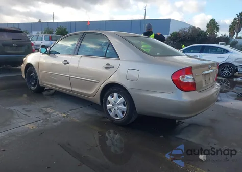2002 Toyota Camry Le z USA, uszkodzony, nr VIN 4T1BE32K32U008112